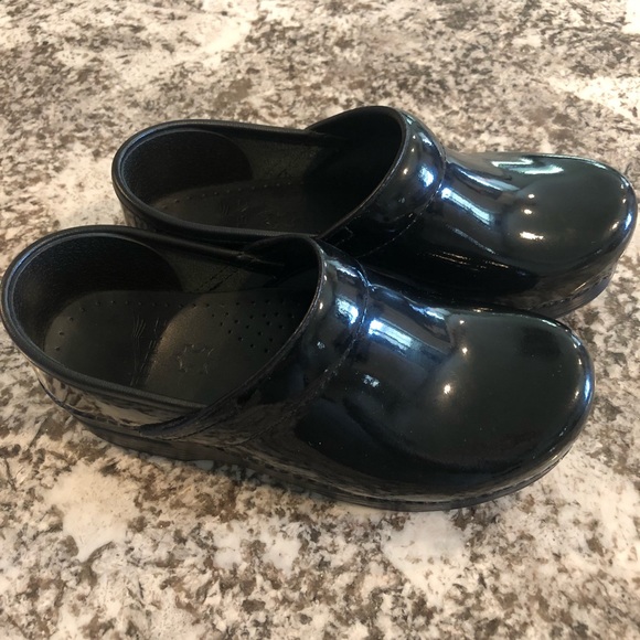 black patent clogs